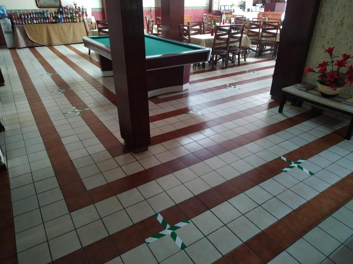 Hotel Topacio ซานฮวน เด ลอสลากอส ภายนอก รูปภาพ